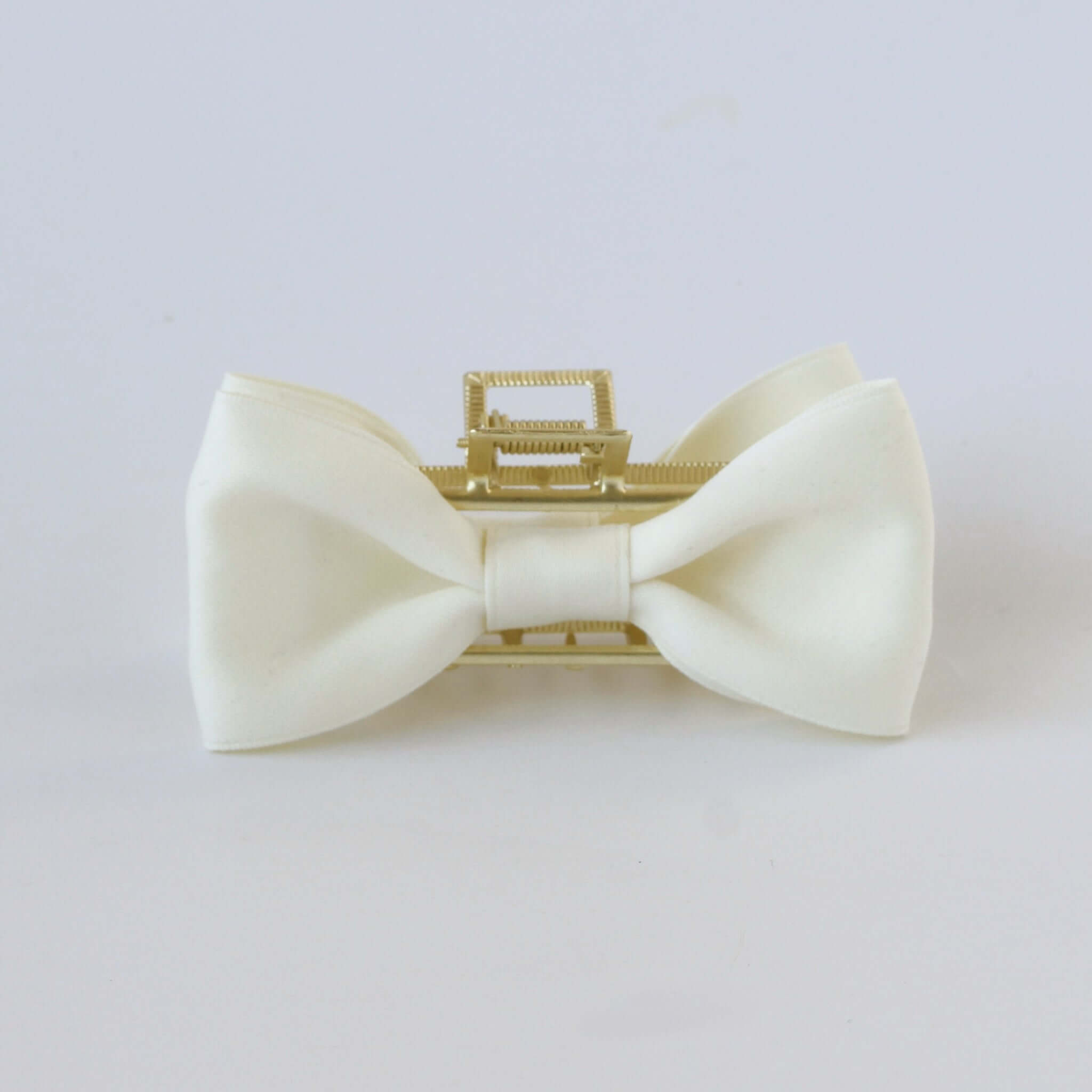 Ivory off white satin bow claw clip with gold clasp – elegant hair accessory for brides.