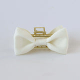 Ivory off white satin bow claw clip with gold clasp – elegant hair accessory for brides.