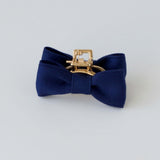 Navy blue matte satin bow on gold claw clip. Handmade hair accessories.