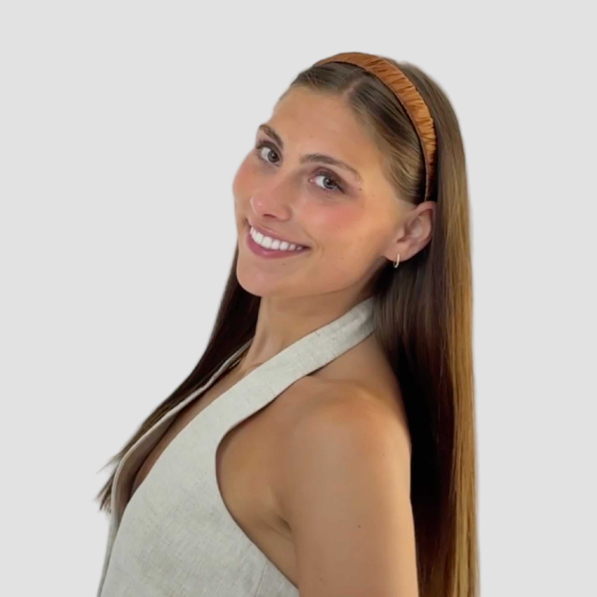 Woman with long brown hair wearing a 1 inch Hannah headband in coffee brown against a white background