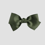 Moss green bow on a white background