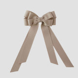 Oatmeal grosgrain Emerson bow with long tails on a white background