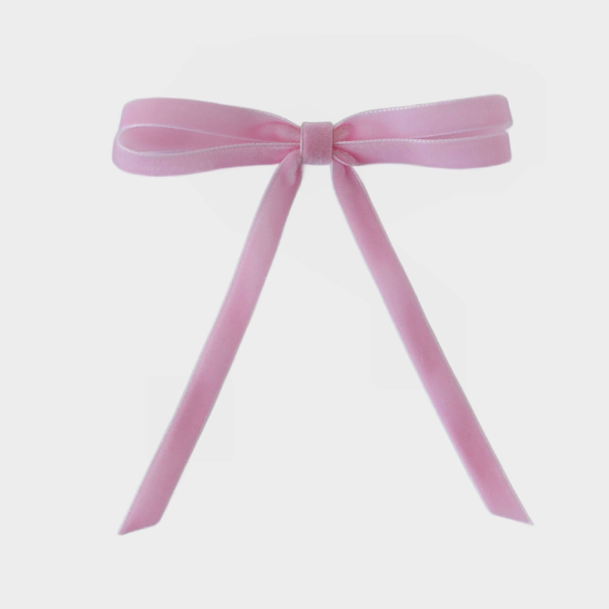 Light pink velvet skinny hair clip bow. Your Final Touch handmade accessories.