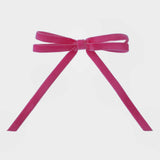 Shocking pink concert lover hair accessory.
