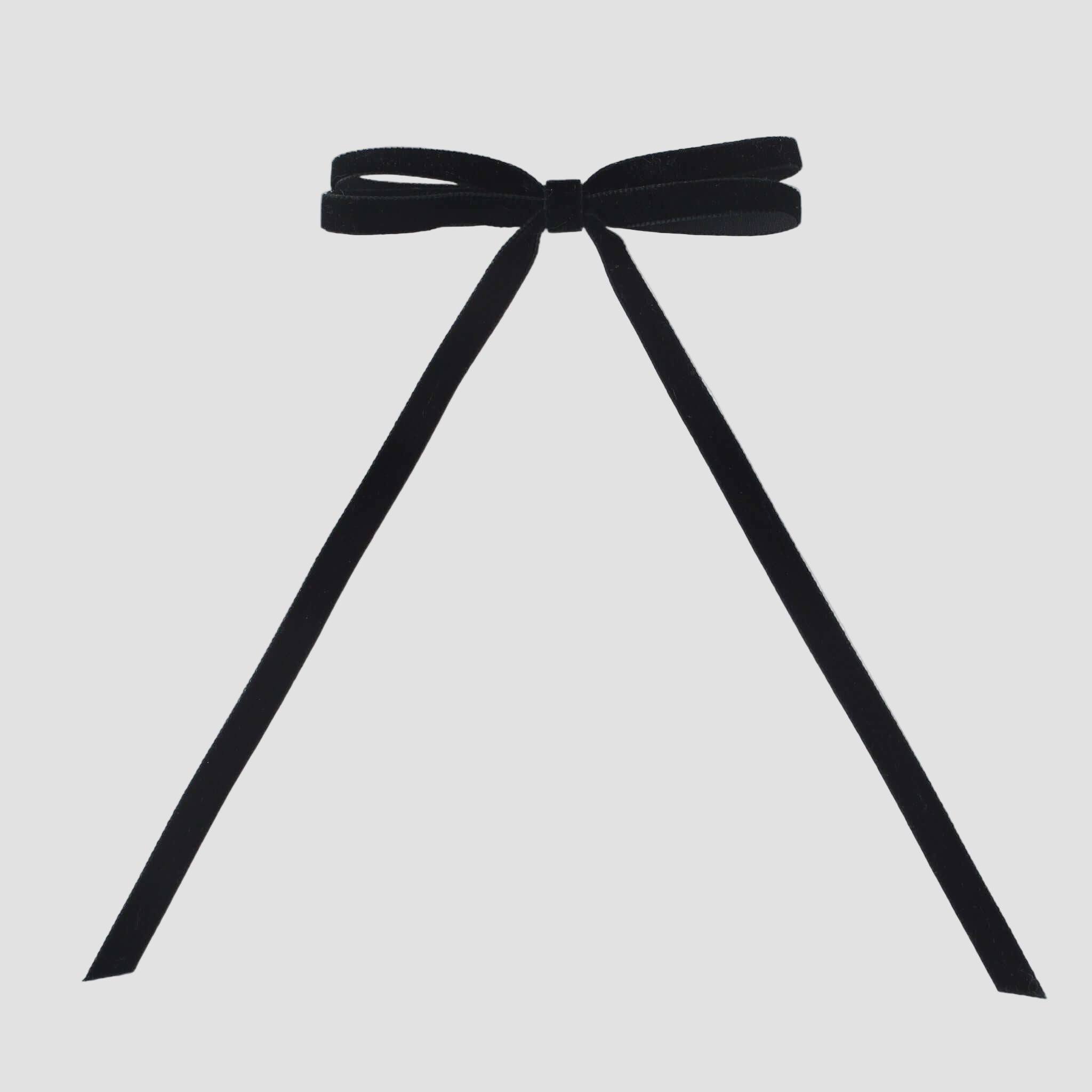 Olivia velvet hair bow in black on a white background