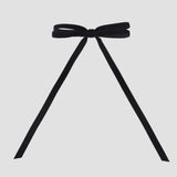 Olivia velvet hair bow in black on a white background