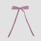 Olivia velvet hair bow in light pink on a white background