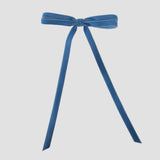 Olivia velvet hair bow in williamsburg blue on a white background