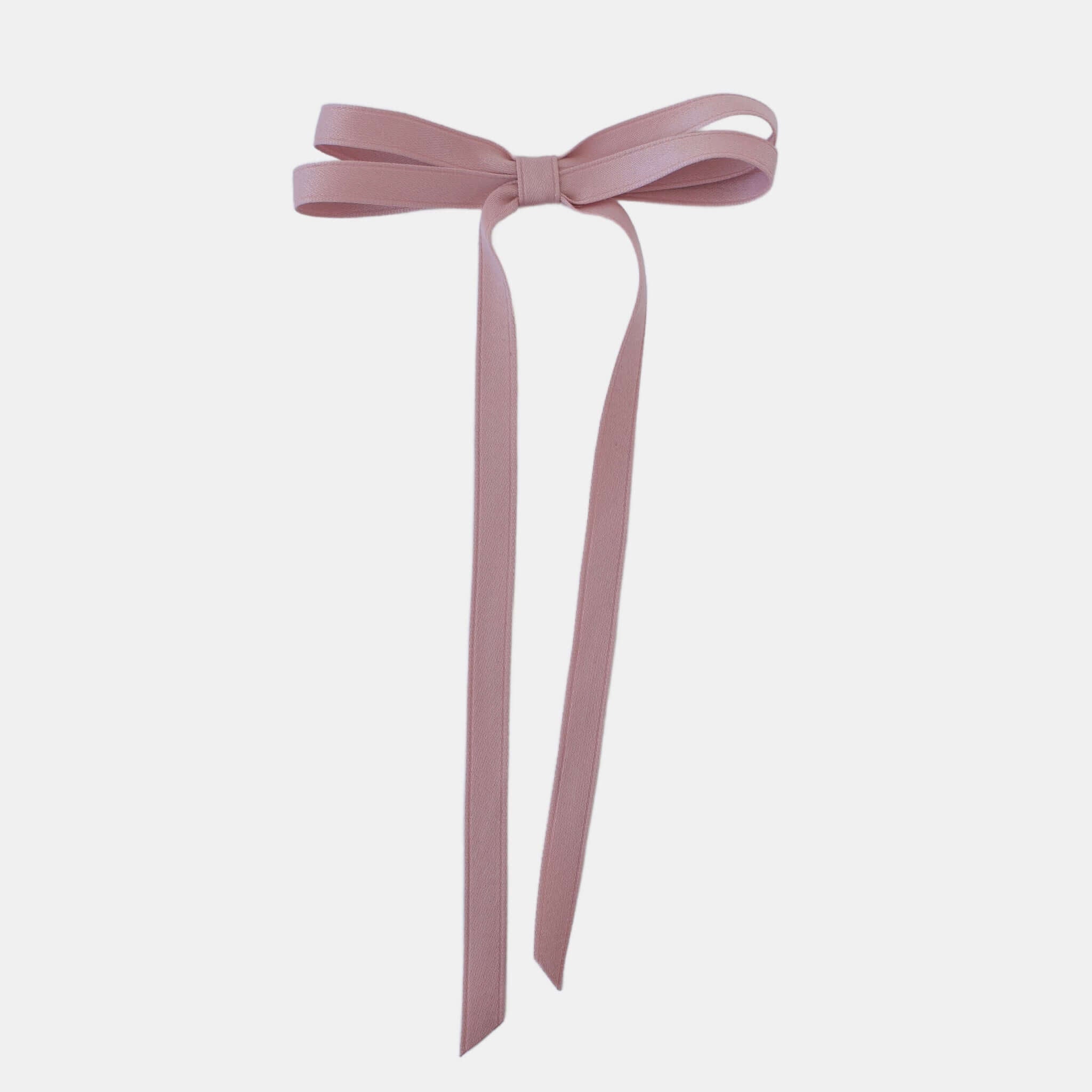 Handcrafted Olivia Matte Satin Bow in blush pink, made with sustainable recycled matte satin ribbon.