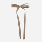 Olivia Matte Satin Bow in eco-friendly beige, handmade from sustainable recycled ribbon for stylish hair accessories.
