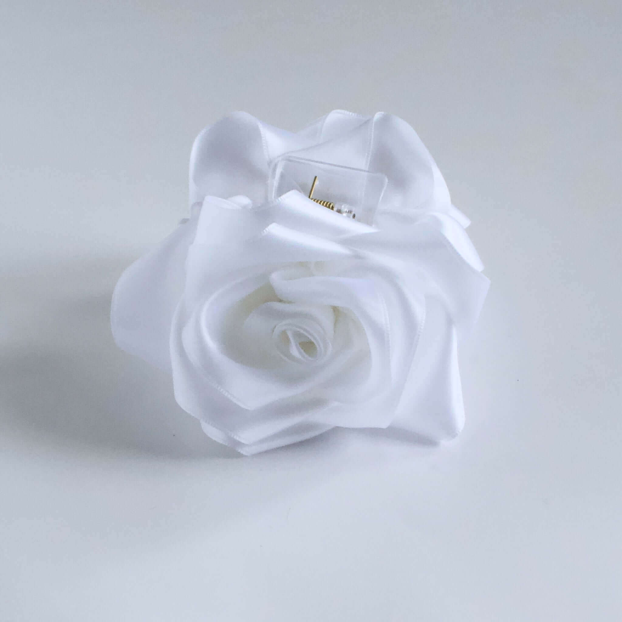 White satin flower claw clip with layered rose petals