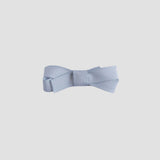 silver grey bow on a white background