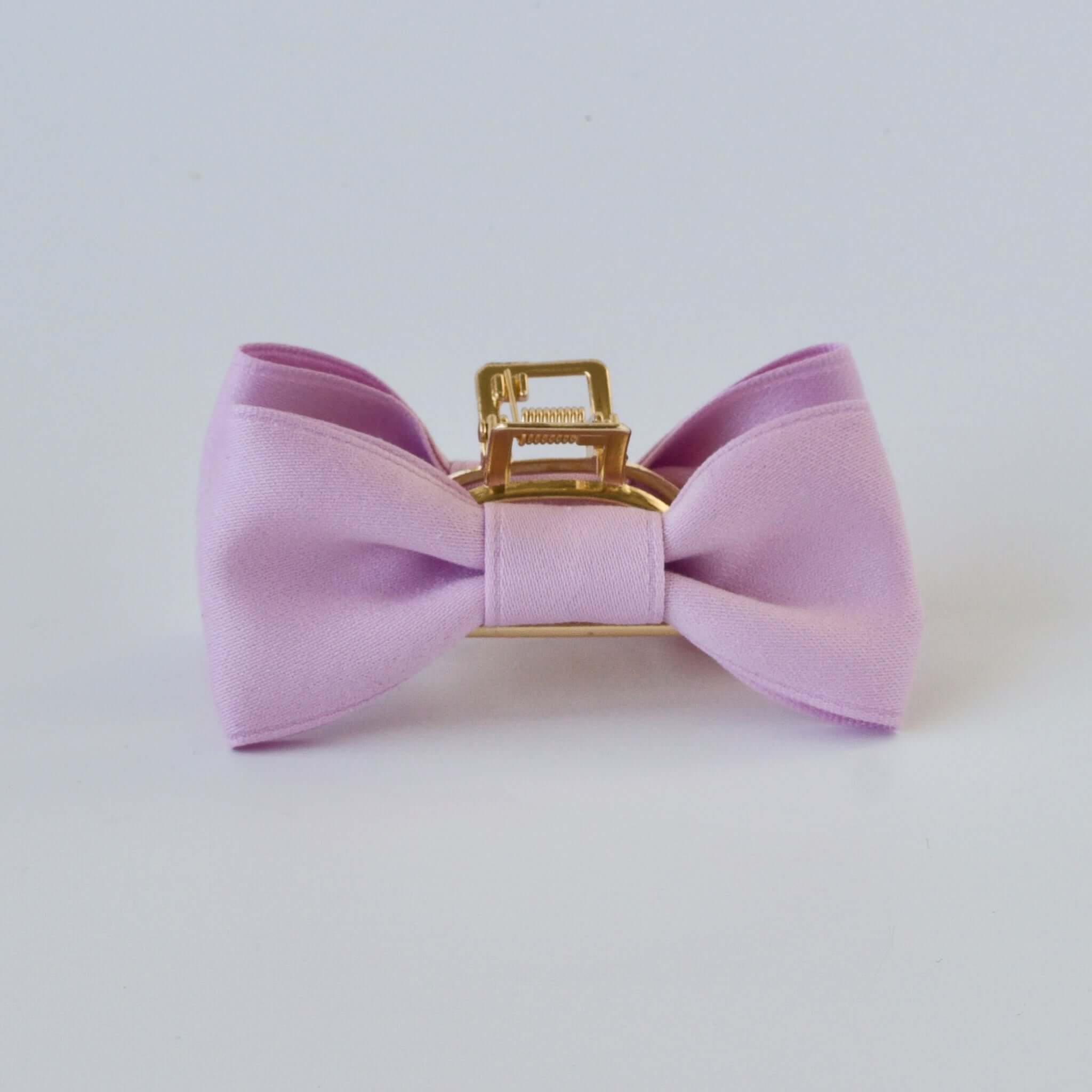Lavender purple matte satin bow claw clip. Designer hair accessories for adult women.