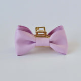 Lavender purple matte satin bow claw clip. Designer hair accessories for adult women.