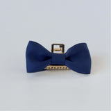 Navy blue vintage-inspired hair bow claw clip.