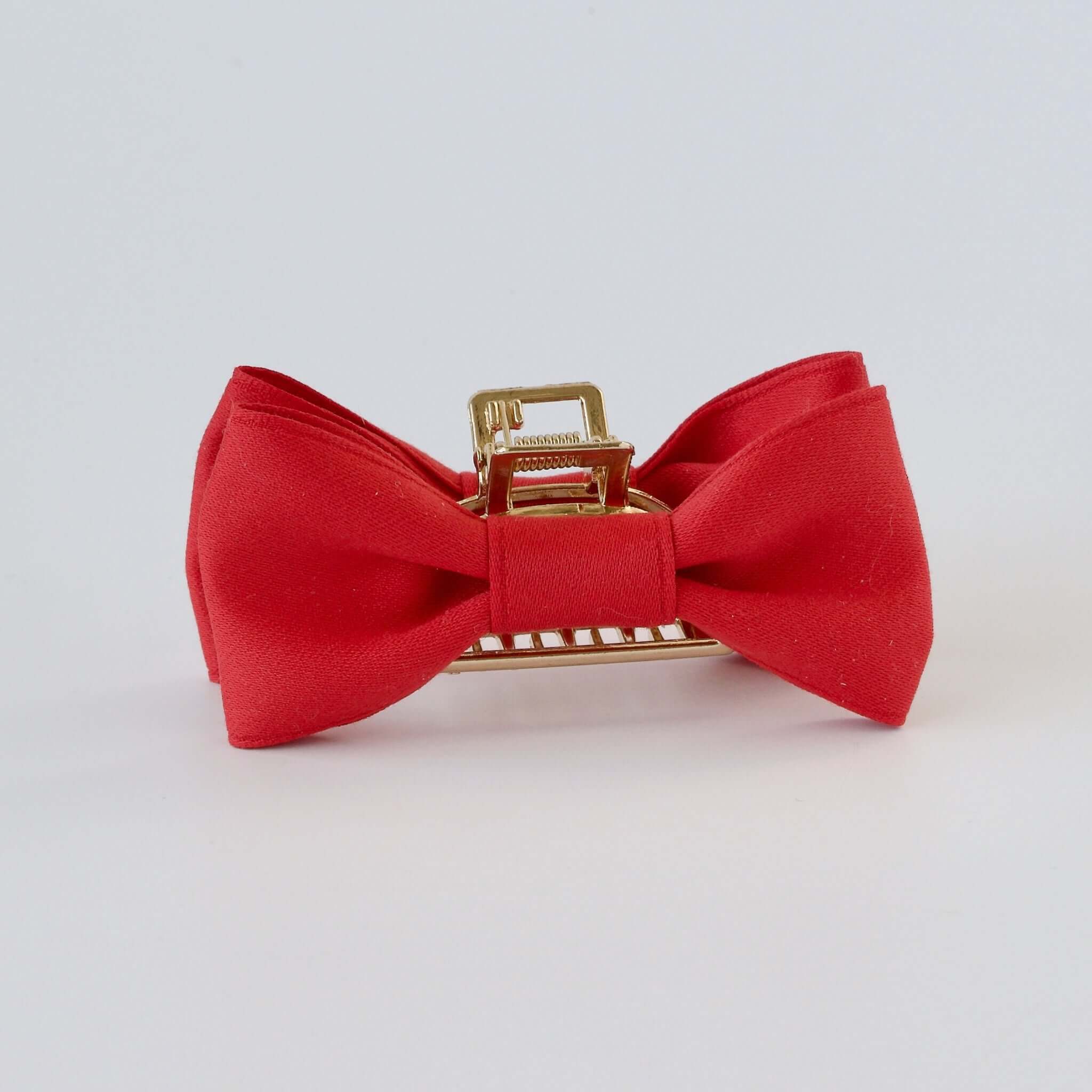 Trending red satin bow claw clip for prom, weddings and everyday wear.