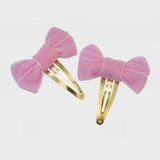 Set of bow snap clips in light pink. Chic hair accessories 2025.