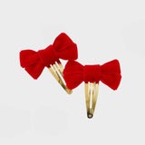 Set of bow snap clips in red. Chic hair accessories 2025.