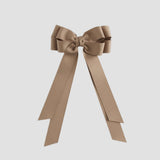 Taupe bow on a white background