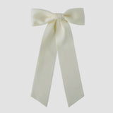 Zoe Matte Satin Bow in ivory, oversized long tail hair bow handmade with sustainable recycled matte satin ribbon for wedding and everyday wear.