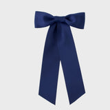 Zoe Matte Satin Bow in navy, oversized long tail hair bow handmade with sustainable recycled matte satin ribbon for weddings and everyday wear.