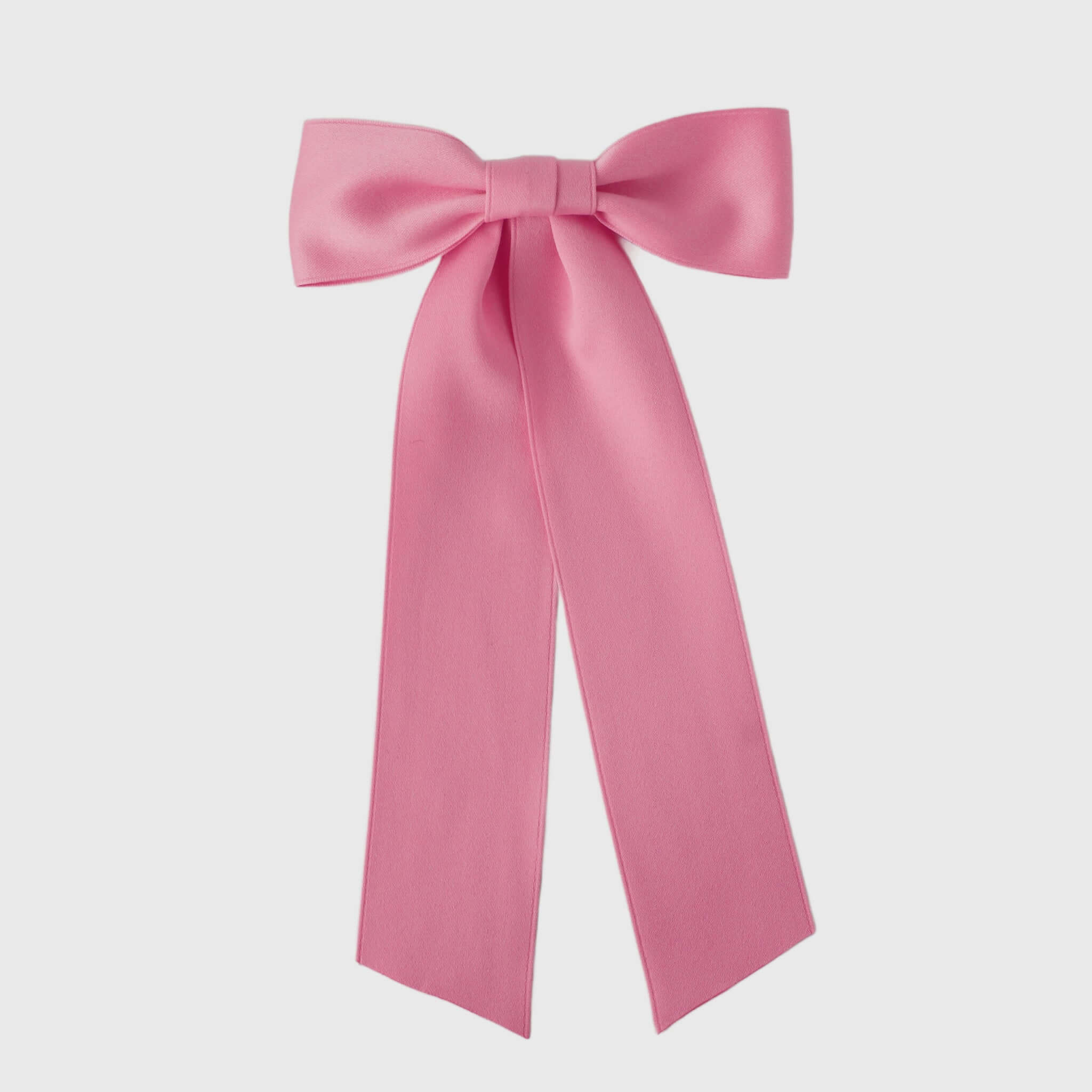 Oversized pink satin bow handmade with sustainable recycled matte satin ribbon for wedding and everyday wear.