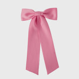 Oversized pink satin bow handmade with sustainable recycled matte satin ribbon for wedding and everyday wear.