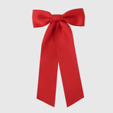 Zoe Matte Satin Bow in red, oversized long tail hair bow, handmade with sustainable recycled matte satin ribbon for weddings and everyday wear.
