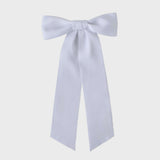 Oversized long tail hair bow handmade with sustainable recycled matte satin ribbon, perfect for wedding and everyday wear.
