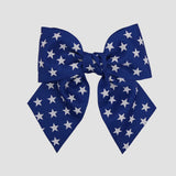Royal blue 5 inch sailor bow with white star on a white background