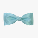 Ava satin bow in aqua on a white background
