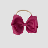 5 inch Grosgrain Penelope hair bow Headband in Azalea on a white background