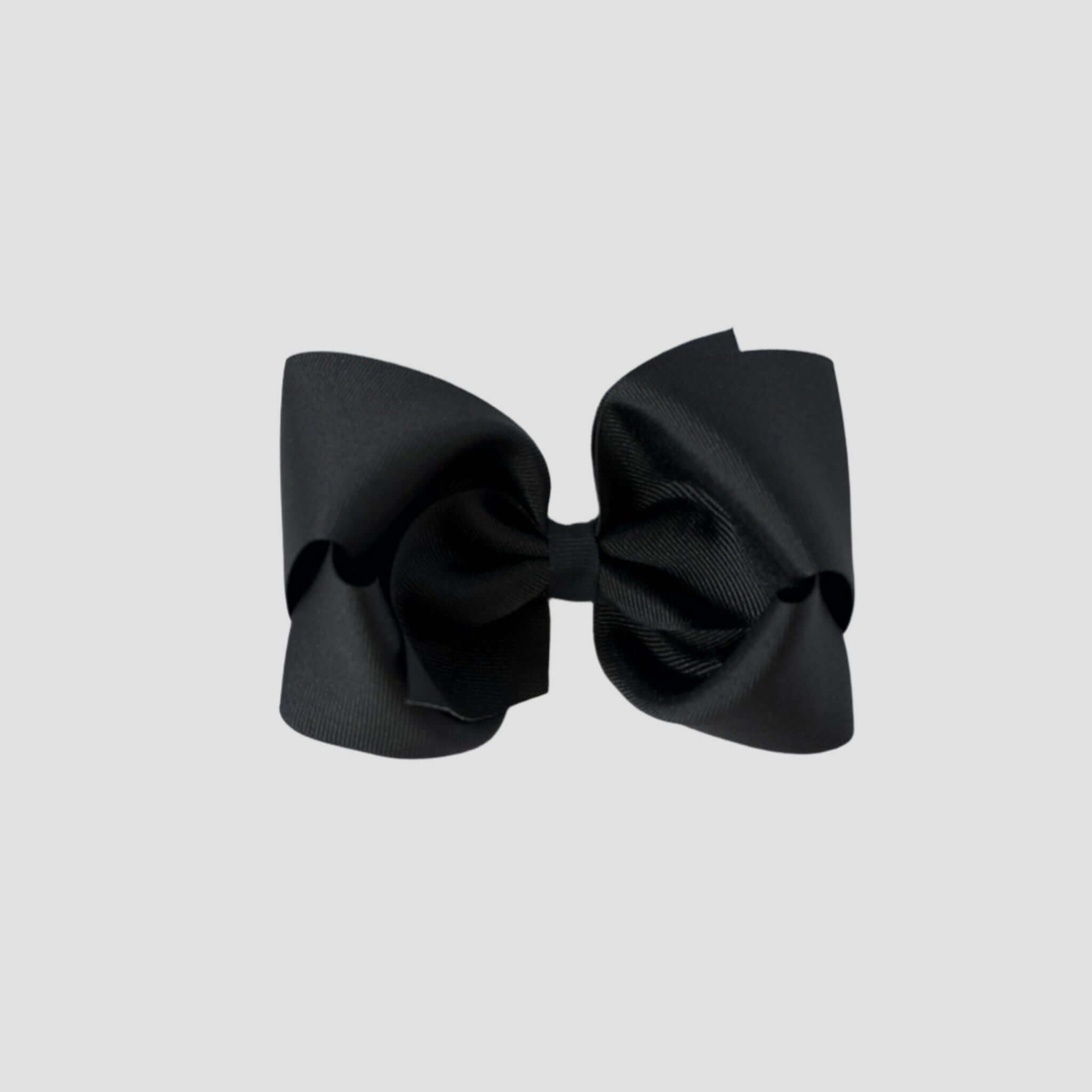 Black hair bow on a white background