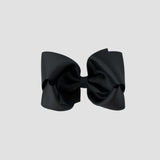 Black hair bow on a white background