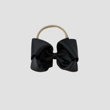 5 inch Grosgrain Penelope hair bow Headband in Black on a white background