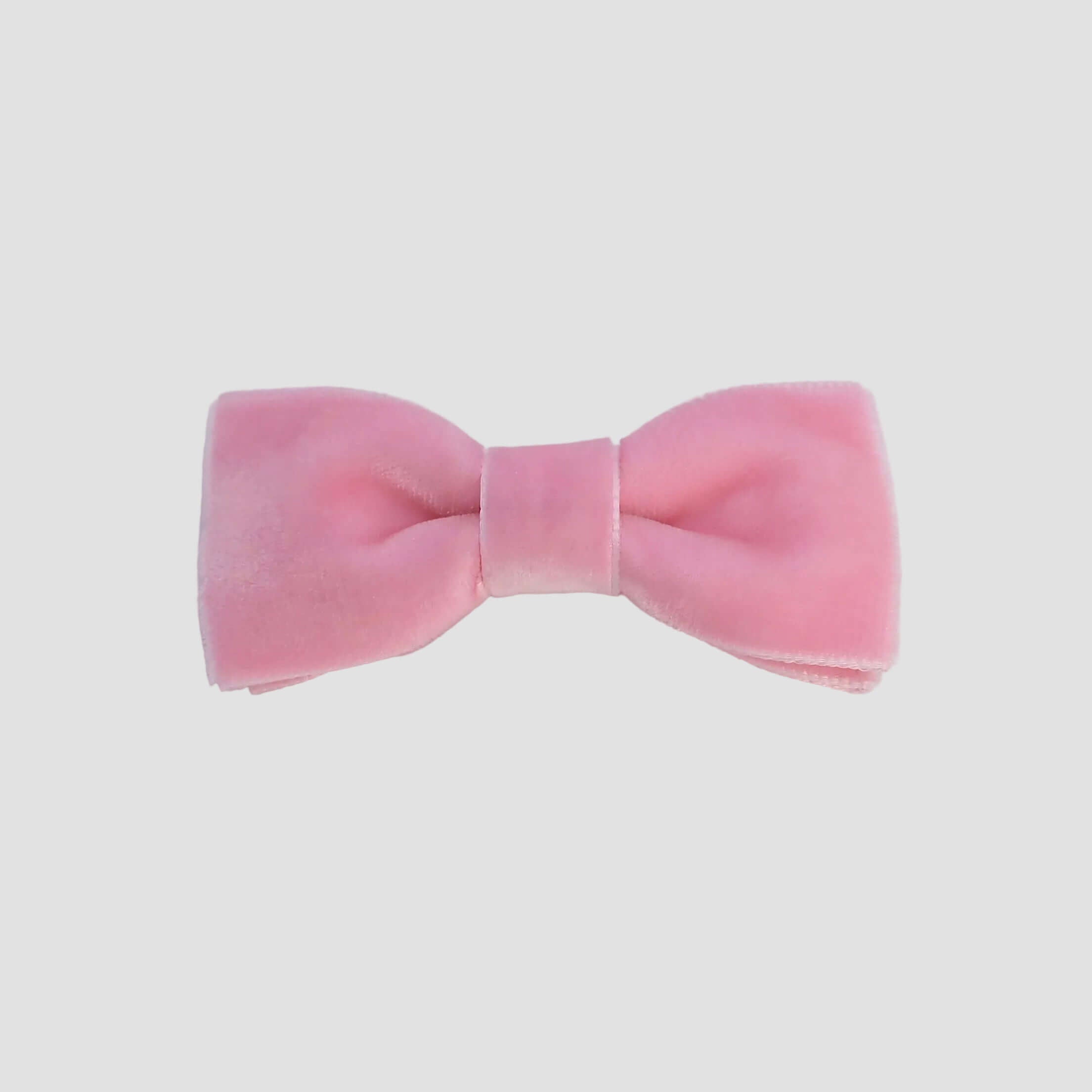 0-24 mos Blush Pink velvet bow tie on a white background