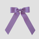 Dark orchich grosgrain Zoe Petite bow on a white background