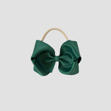 5 inch Grosgrain Penelope hair bow Headband in forest green on a white background