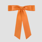 Grace satin hair bow in tangerine orange 