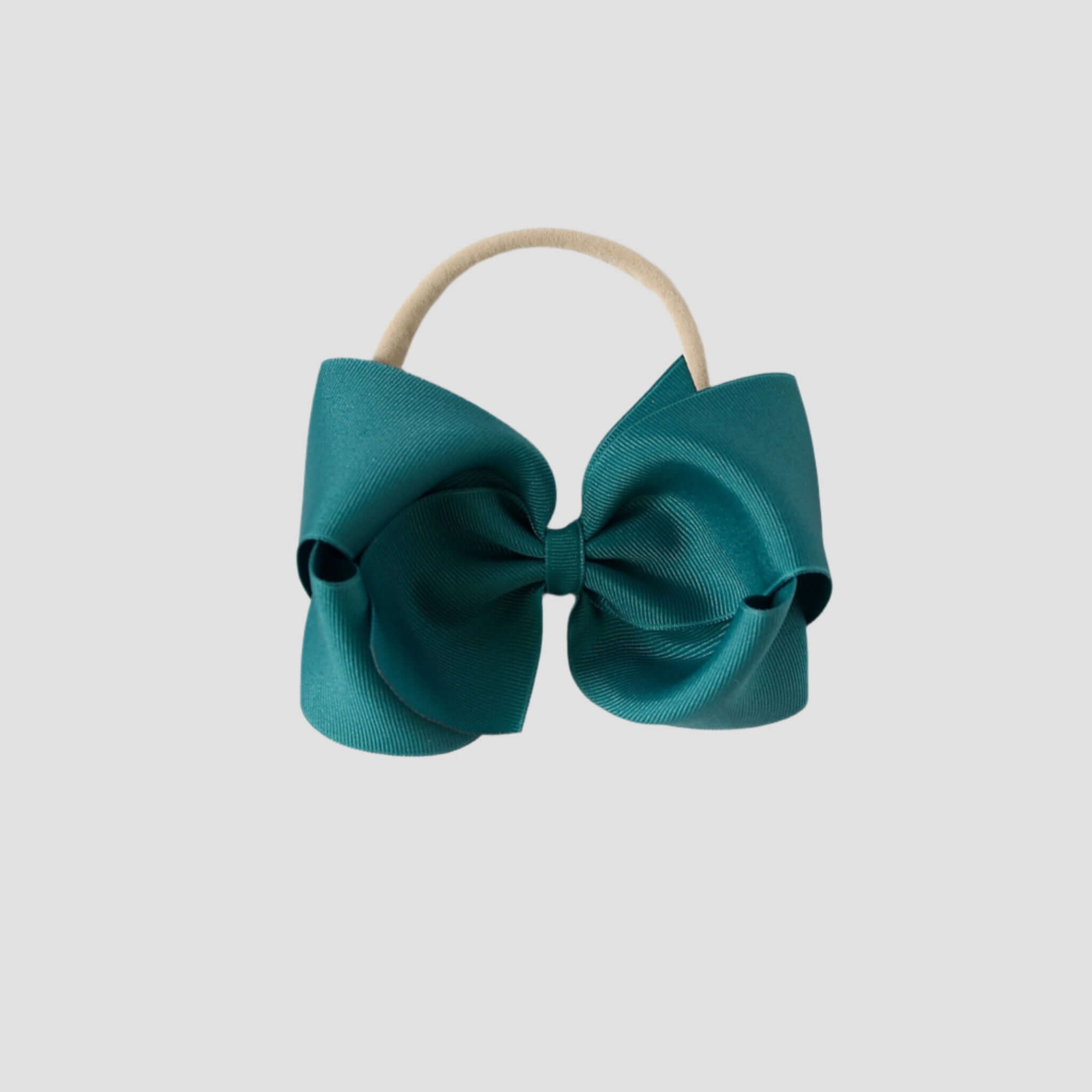 5 inch Grosgrain Penelope hair bow Headband in jade green on a white background