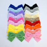 Velvet baby bow headband on soft nylon band for newborns and toddlers. Spring and Summer 2026 