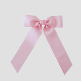 Light pink grosgrain Zoe Petite bow on a white background