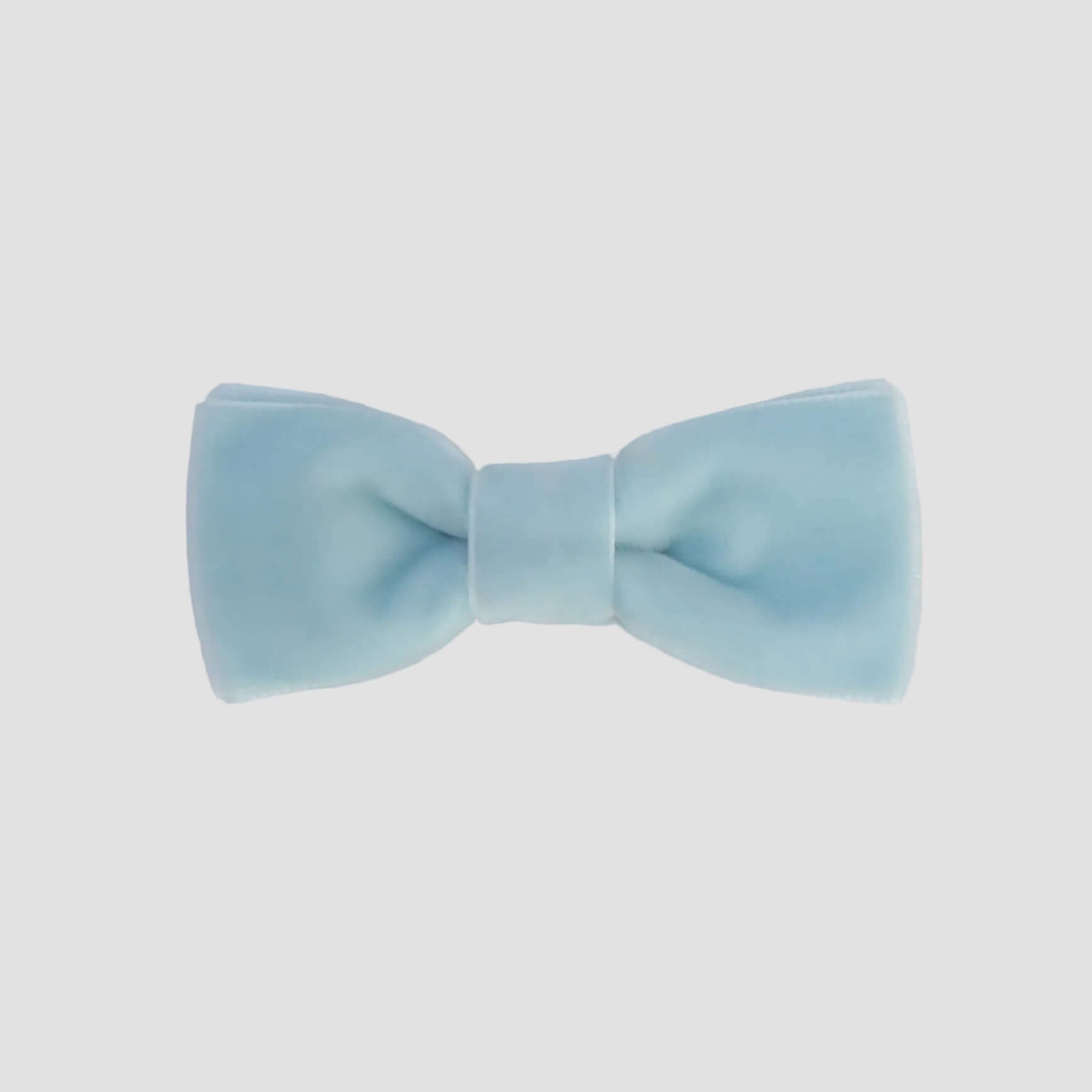 0-24 mos light blue velvet bow tie on a white background