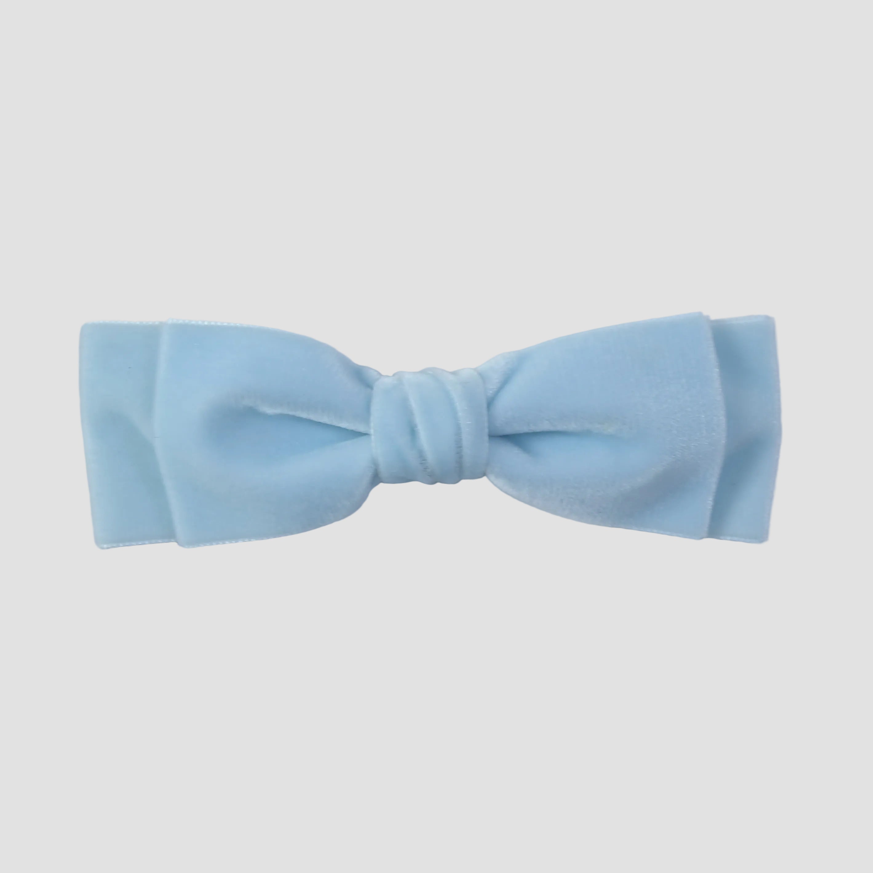 Light blue Ava hair bow tie on a white background