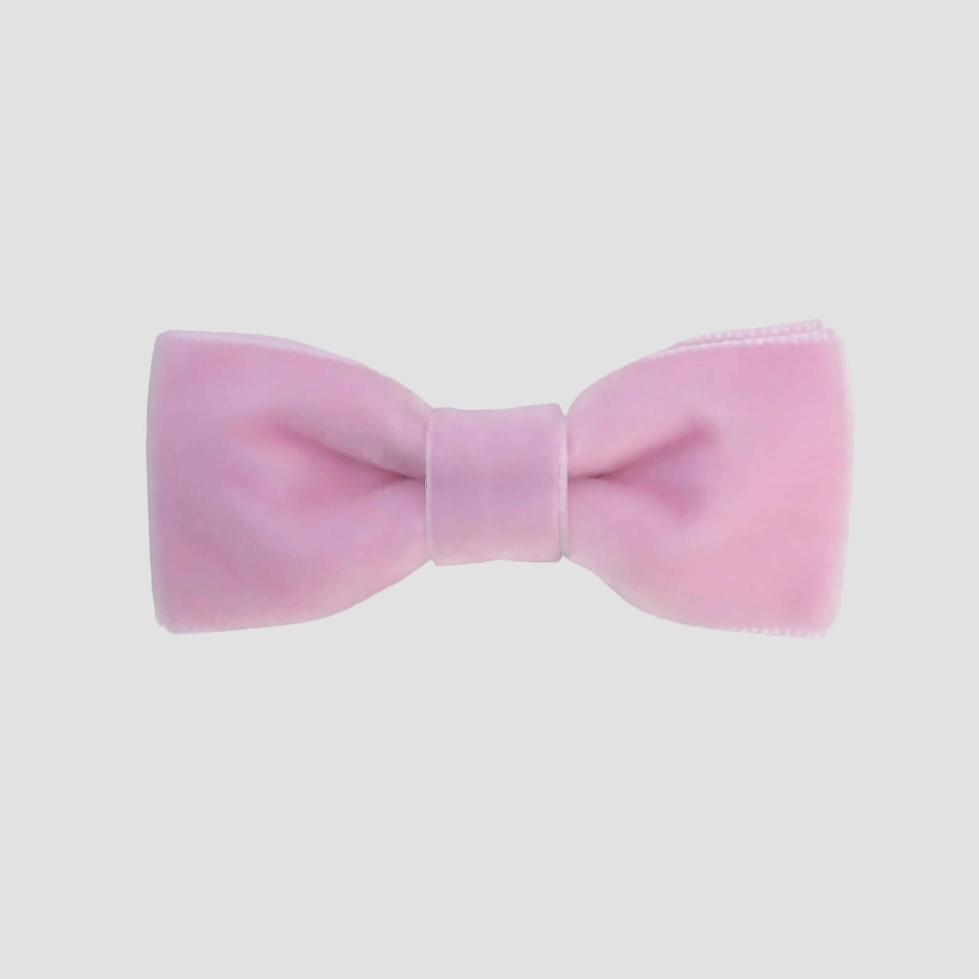 0-24 mos Light Pink velvet bow tie on a white background