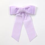 Lilac purple velvet Mia bow on a white background