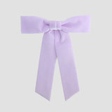 Lilac purple Zoe petite velvet hair bow on a white background.