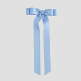 Blue grosgrain ribbon bow on a white background