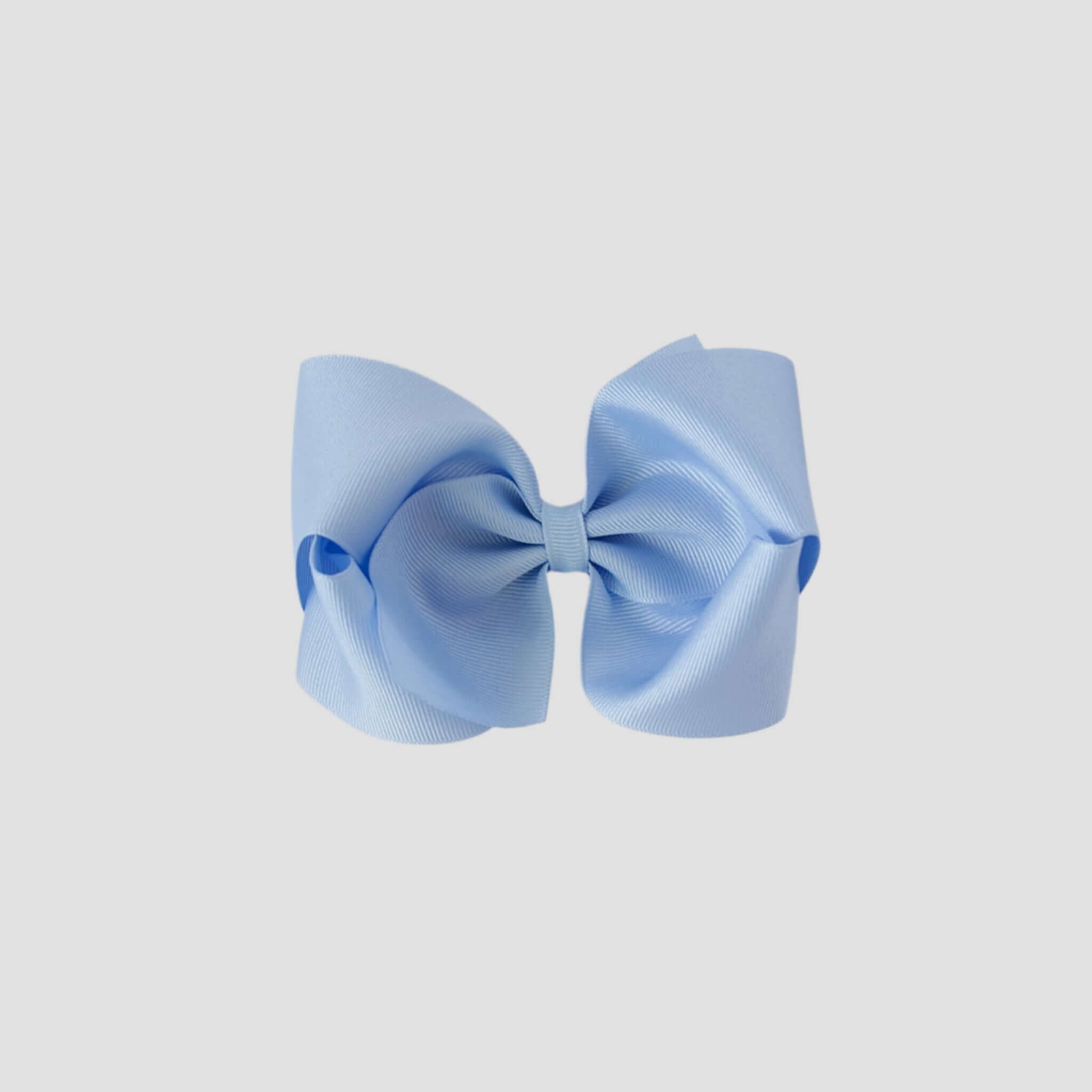 Light blue hair bow on a white background