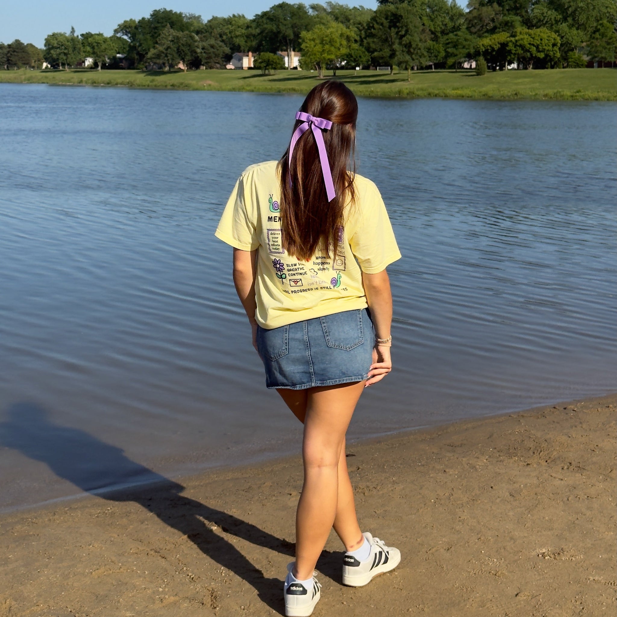 Girls standing at a beach wearing dark orchid grosgrain Bailee bow